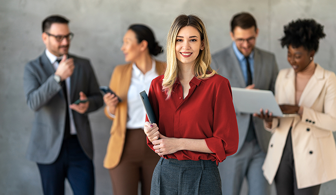 woman-holding-laptop-group-of-people-background-bdo