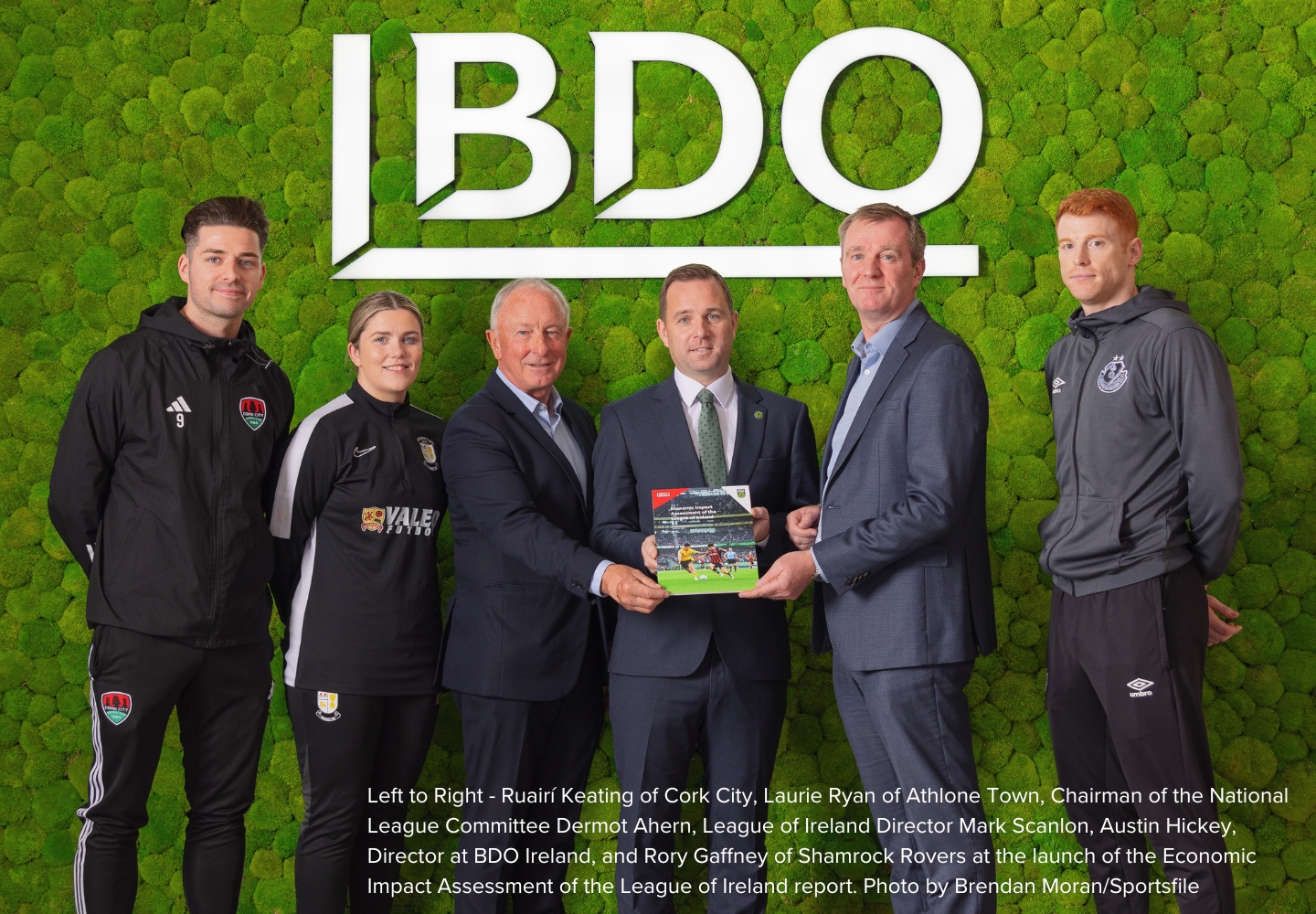 Left-to-Right-Ruairi-Keating-of-Cork-City,-Laurie-Ryan-of-Athlone-Town,-Chairman-of-the-National-League-Committee-Dermot-Ahern,-League-of-Ireland-Director-Mark-Scanlon,-Austin-Hickey,-Director